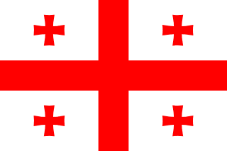 The flag of Georgia has a white field with a large centered red cross that extends to the edges and divides the field into four quarters. A small red Bolnur-Katskhuri cross is centered in each quarter.